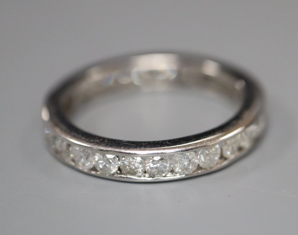A modern 18ct white gold and diamond set full eternity ring, size M gross 2.6 grams.